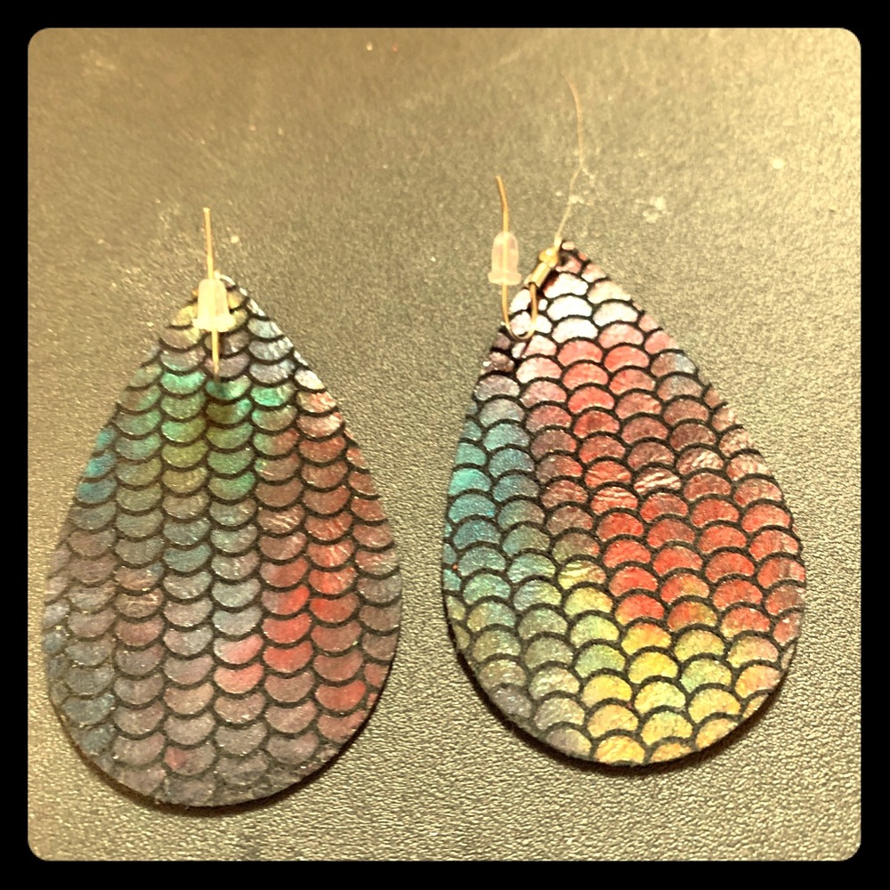 Large Leather Earnings